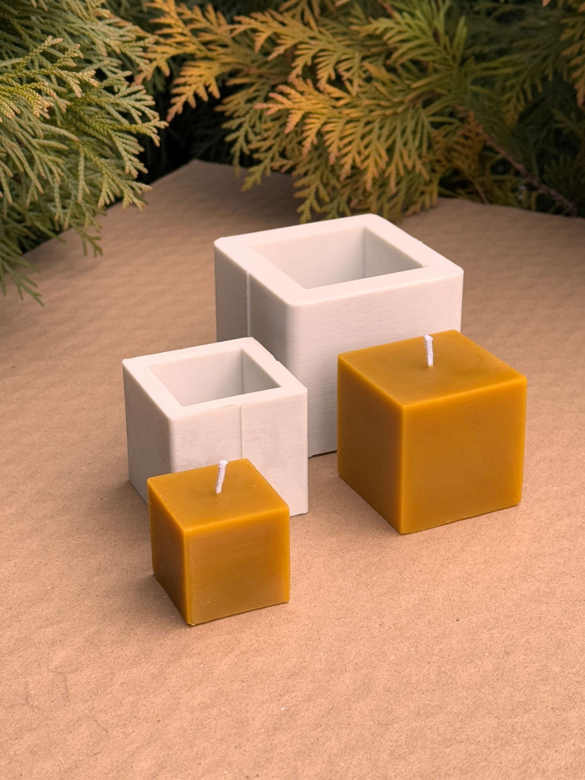 Cute Cubes silicone candle molds with small and medium cube candles displayed.
