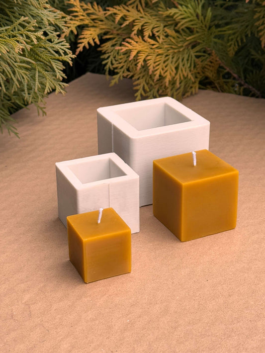 Cute Cubes silicone candle molds with small and medium cube candles displayed.