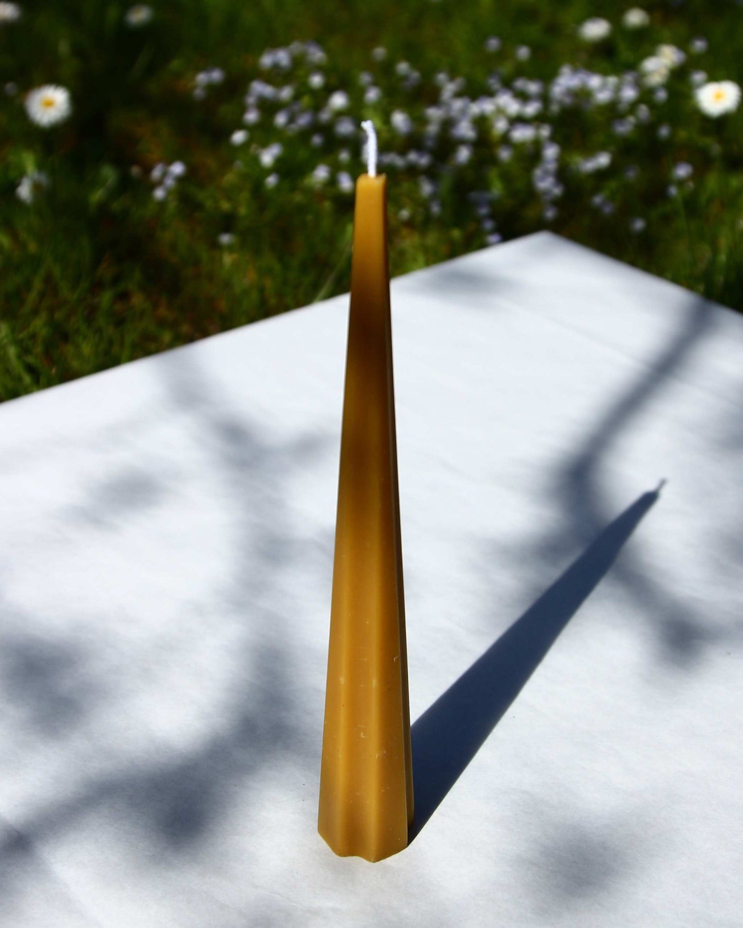 Machu Picchu Taper candle, 7.87 inches tall, outdoors setting.