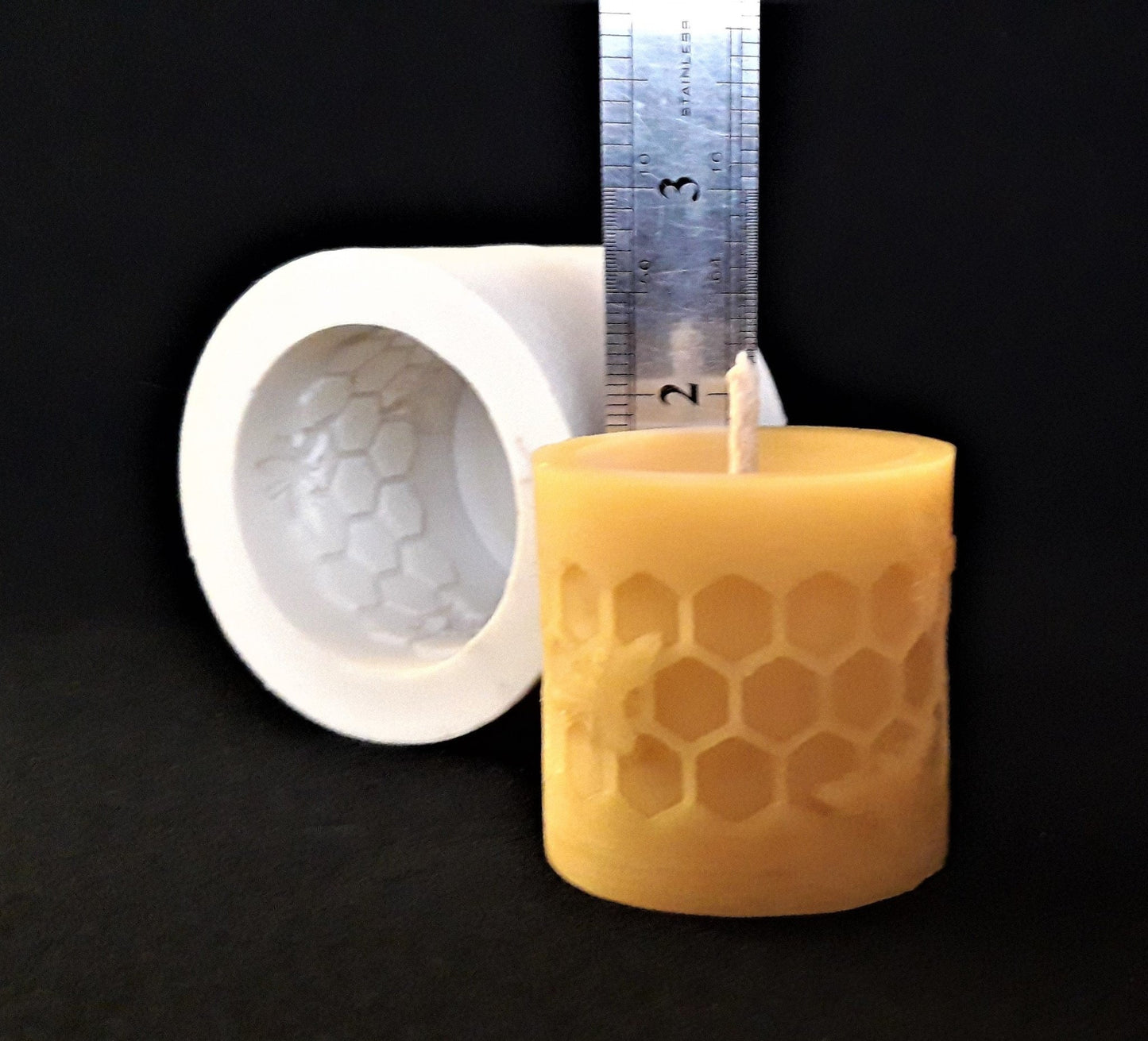 CELLS Silicone Candle mouldBEES ON CELLS Silicone Candle MoldCandle details:
Finished candle size: ~1.8" high x 1.7" wide (or about 4.5 cm x 4.6 cm).Finished candle weight: ~35 g.Silicone MoldLatvian Candles