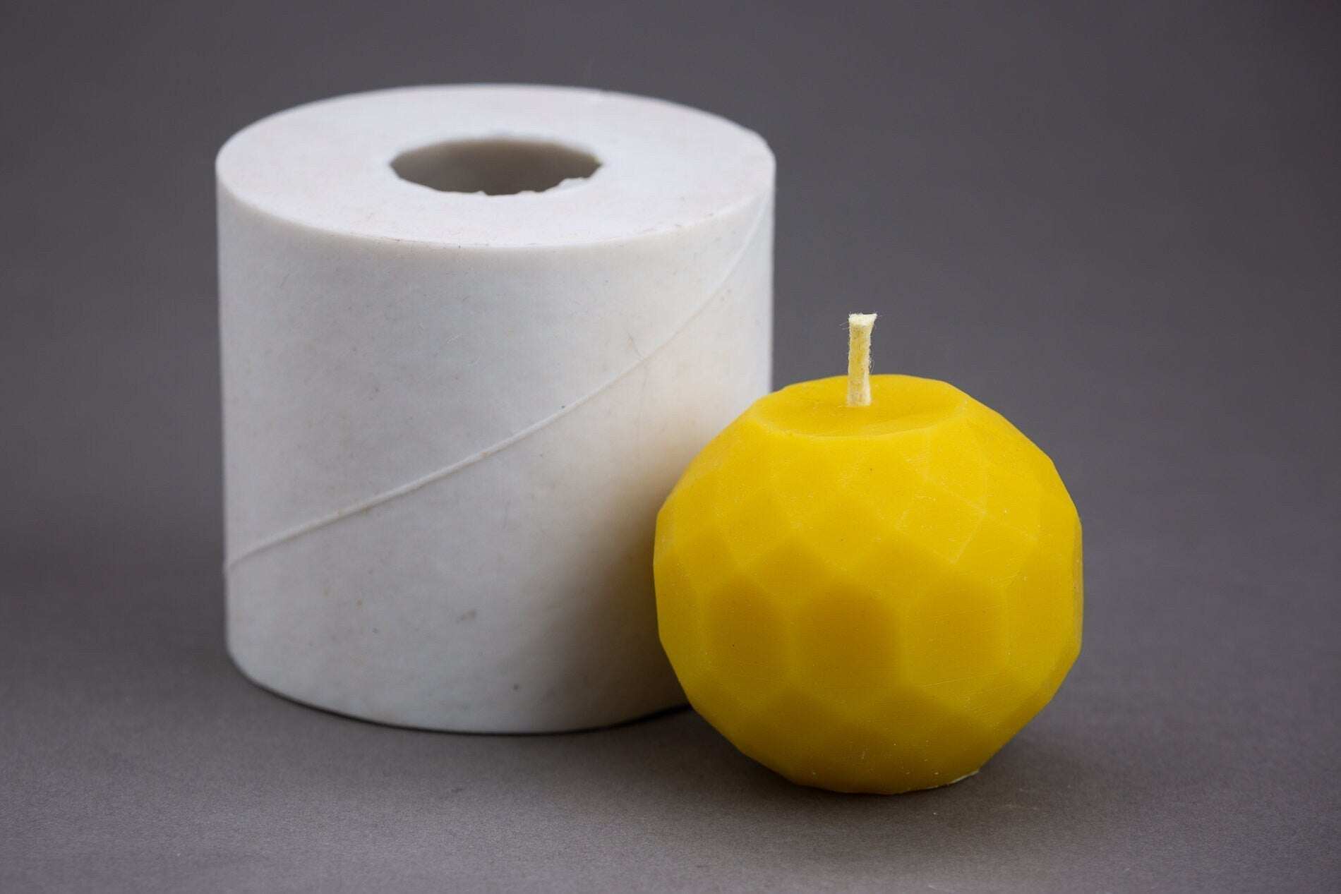 DEERS Silicone Candle Mold with finished yellow candle, 1.7 inches tall.