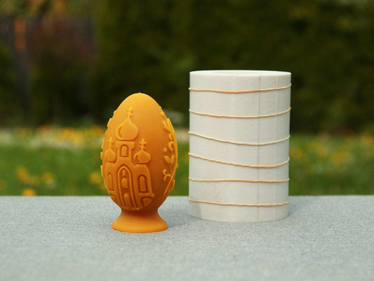 EGG WITH MOTIVES silicone candle mold with intricate design, measuring 11 cm by 6.2 cm.