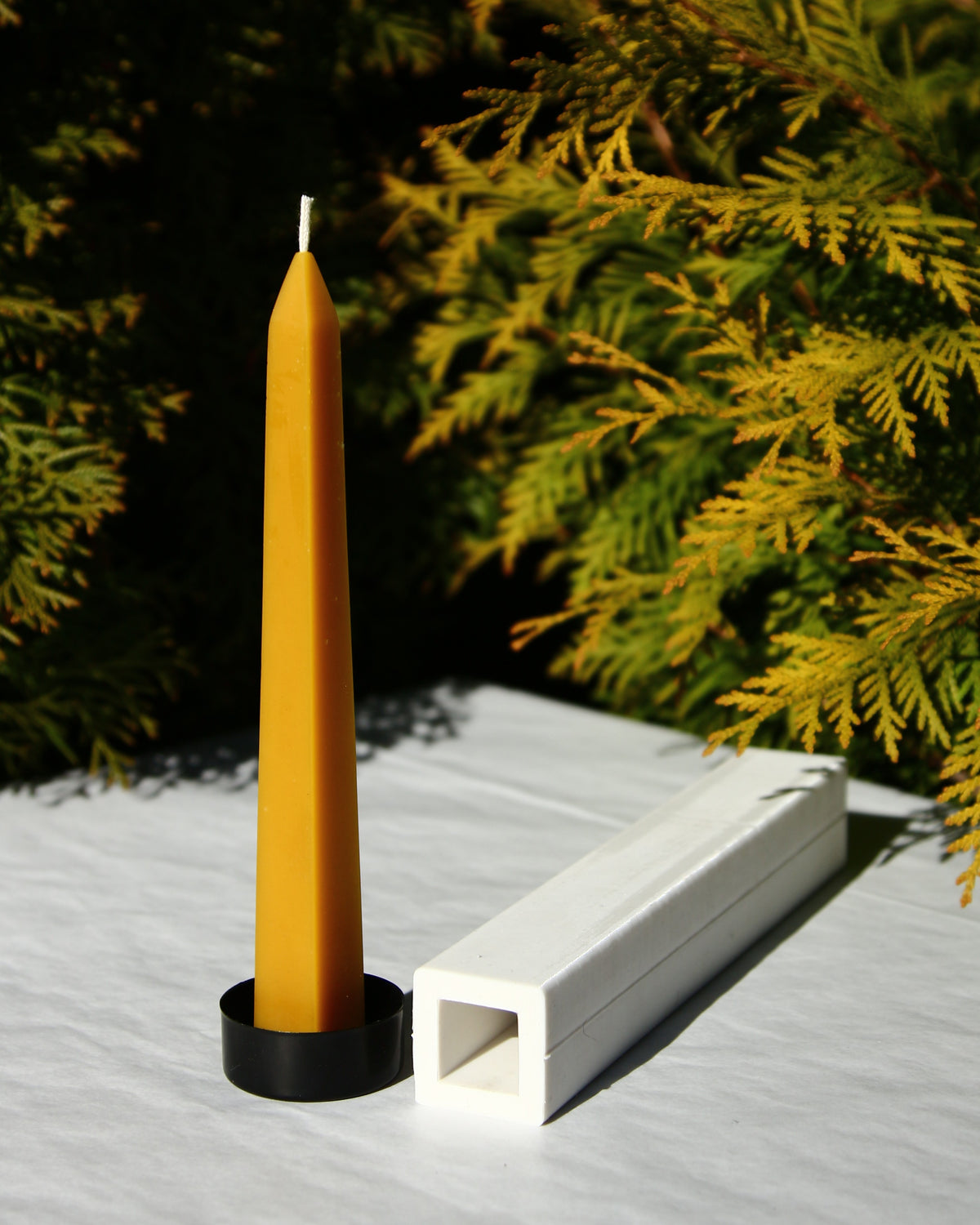 Silicone mould for a tall obelisk-shaped beeswax candle