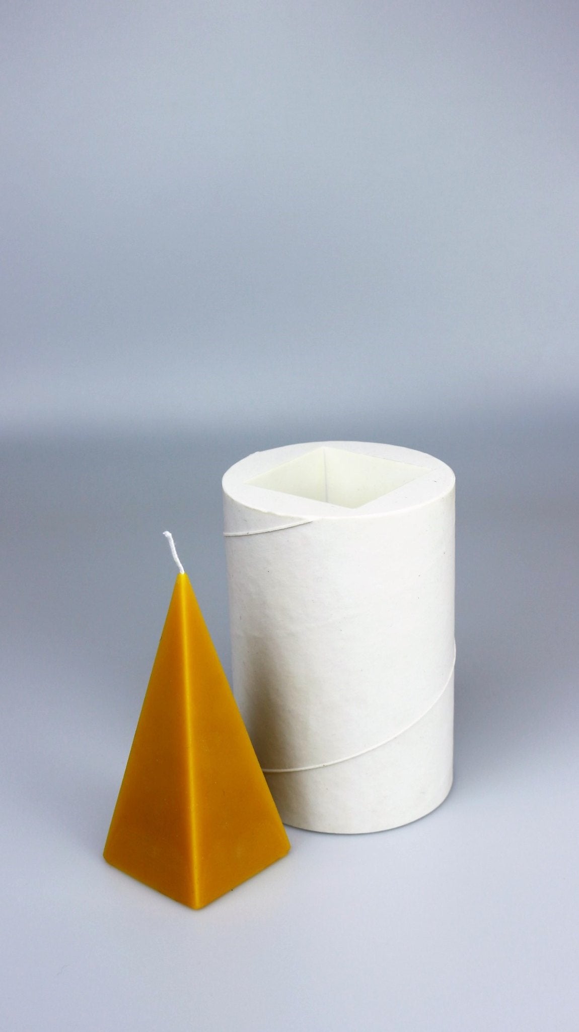 Pyramid beeswax candle and silicone mould