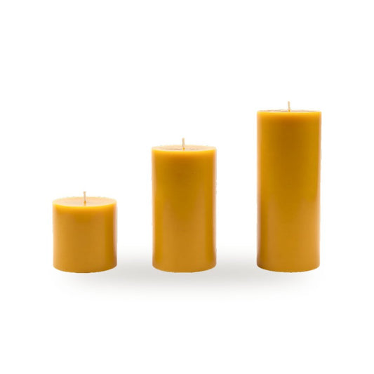 Big Cylinders 3 Sizes beeswax candle, white background studio photo