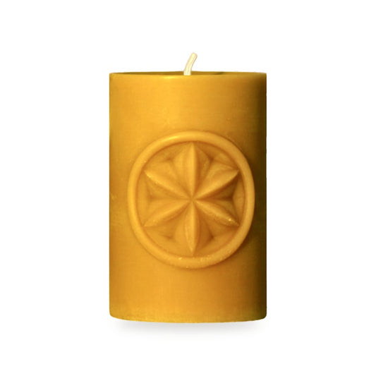 Sun Shield beeswax candle, white background studio photo