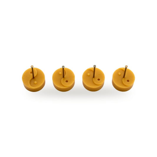 Ying Yang Tea Lights beeswax candle, white background studio photo