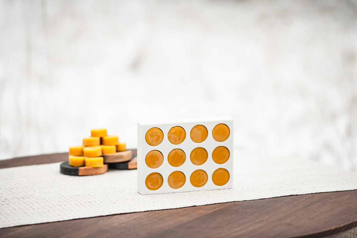 Tea light beeswax candle and silicone mould
