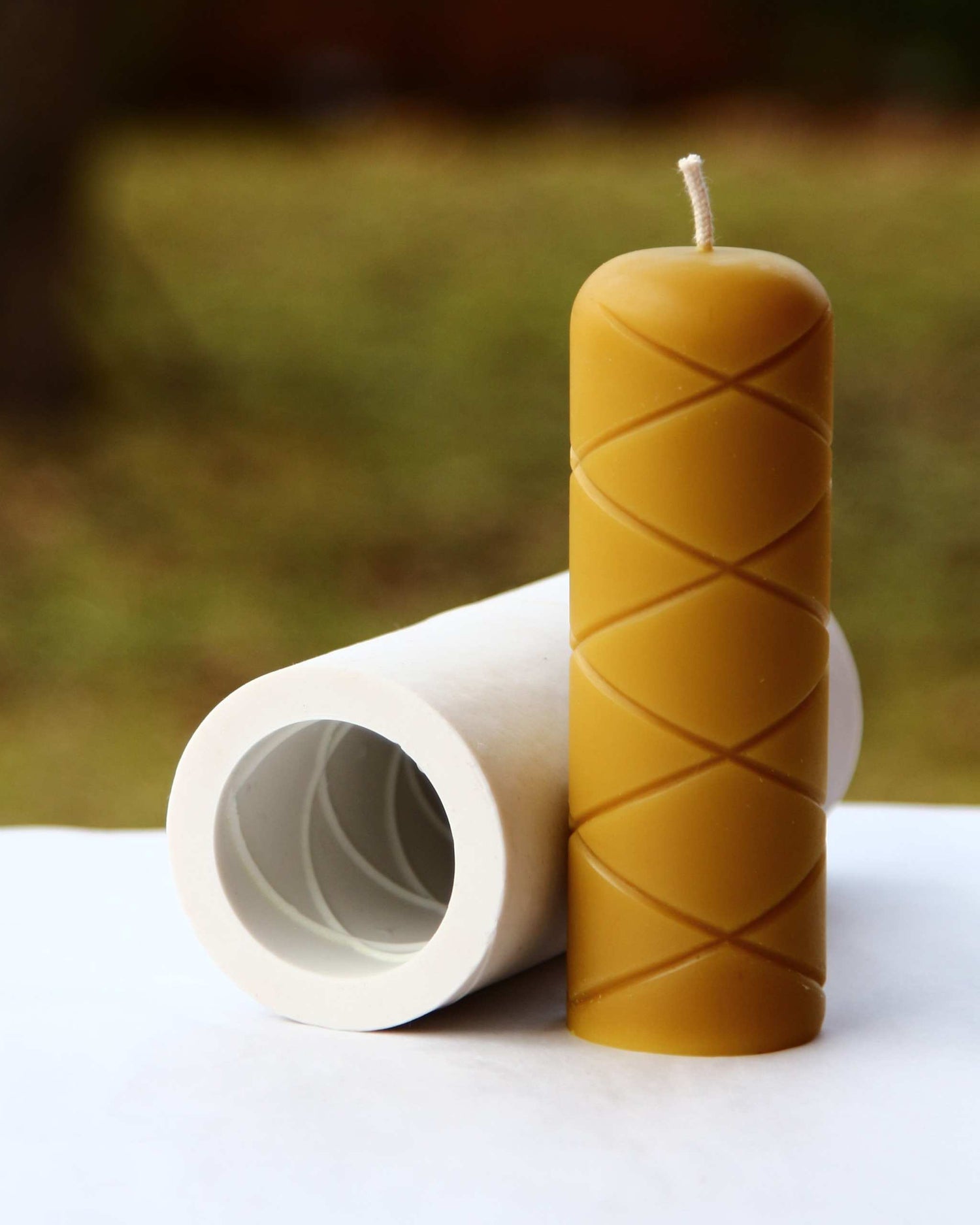 Beeswax candle with intertwined sculptural form