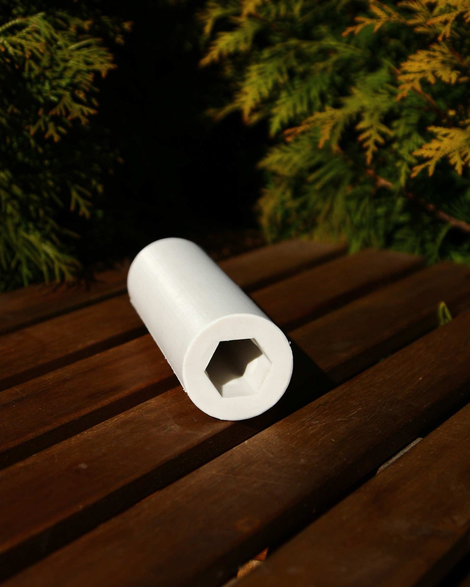 Beeswax candle shaped like a small mosque silhouette