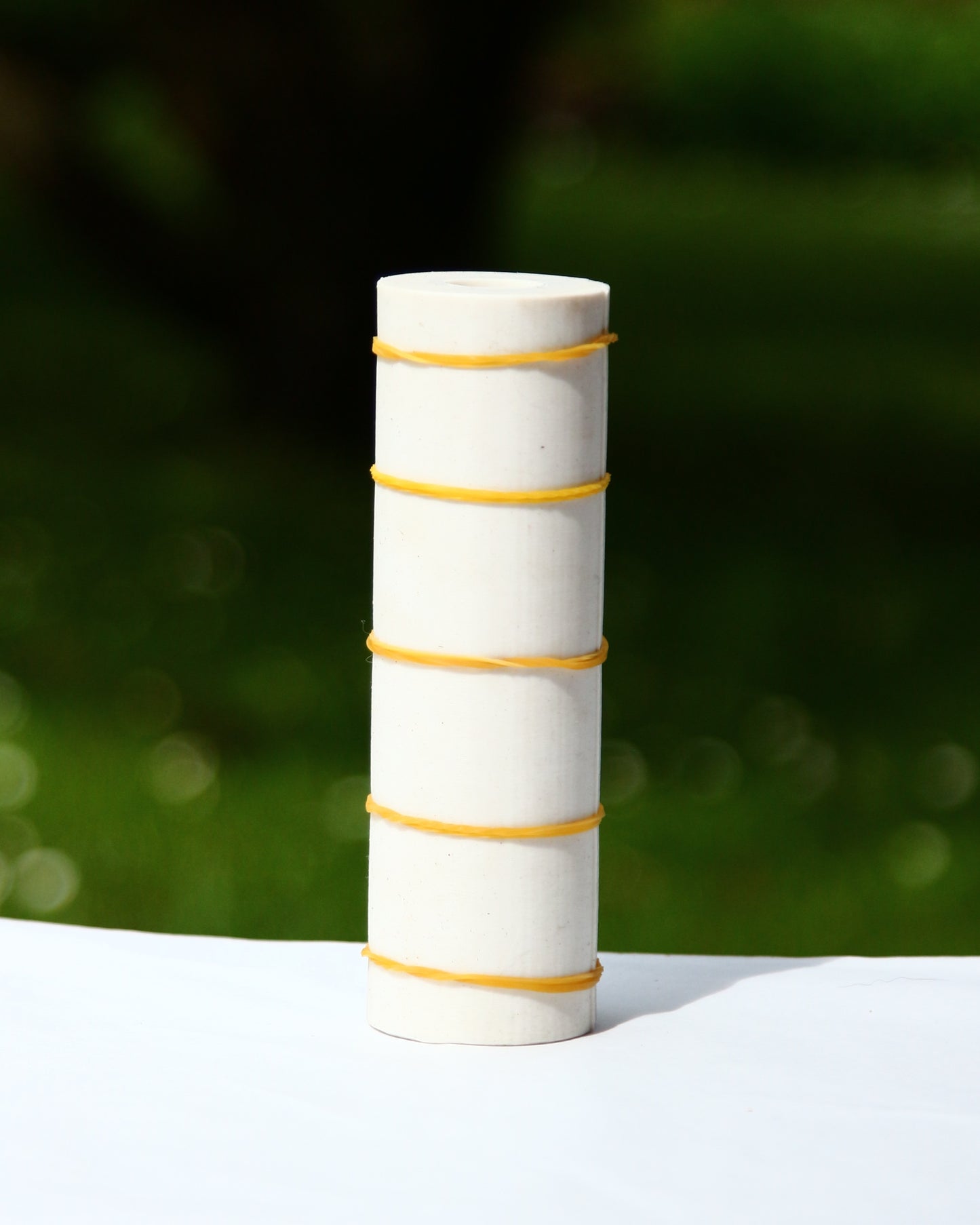 Beeswax candle made using bead-style silicone mold