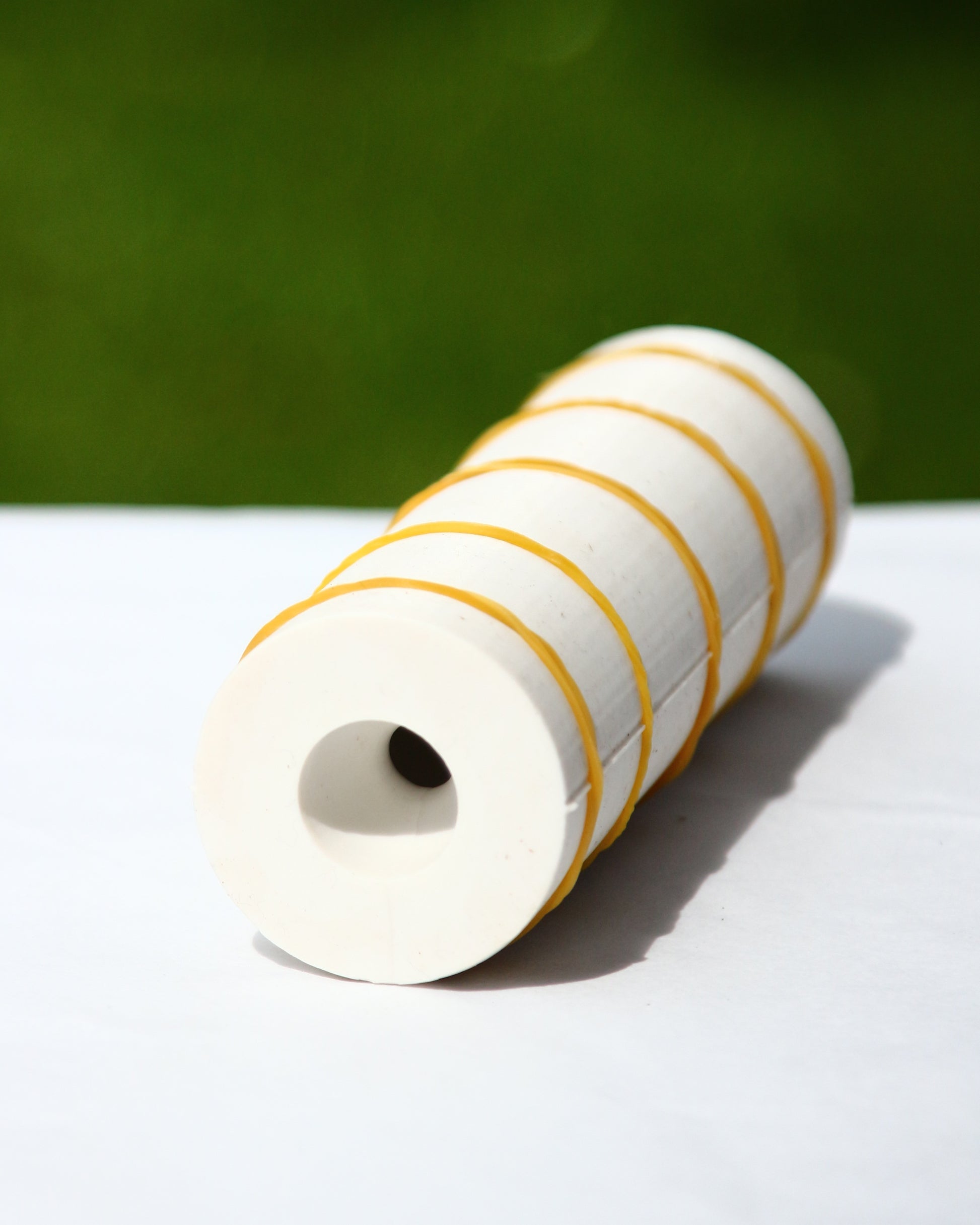 Silicone mold for creating bead-shaped beeswax candles