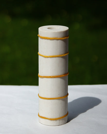 Decorative beeswax candle mold with sculptural bead design