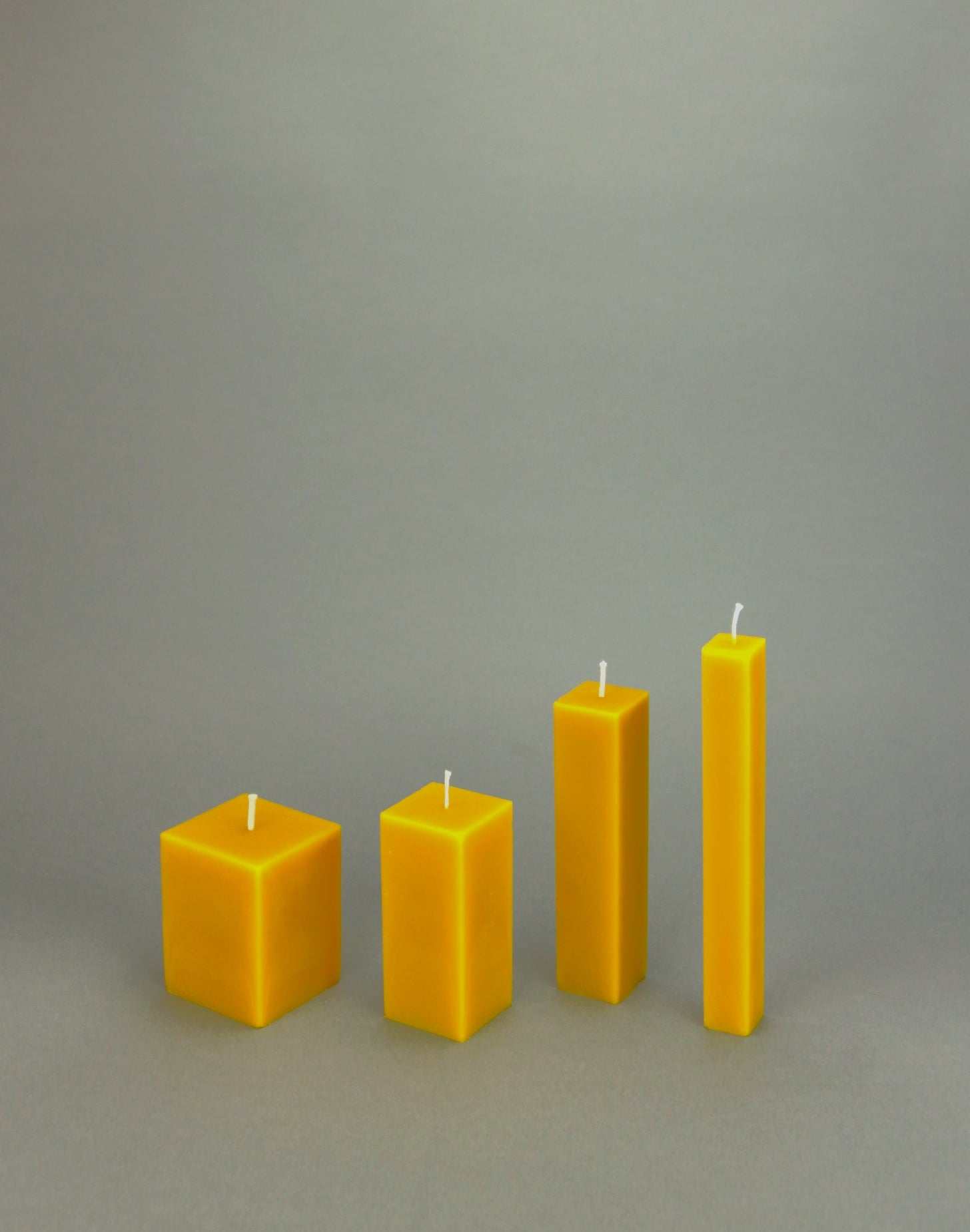 Beeswax candle with clean cube shape