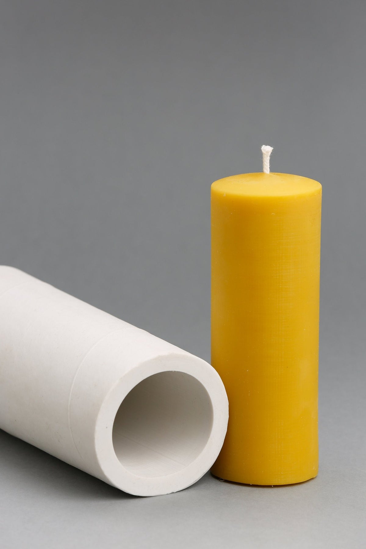 Smooth pillar beeswax candle and silicone mould