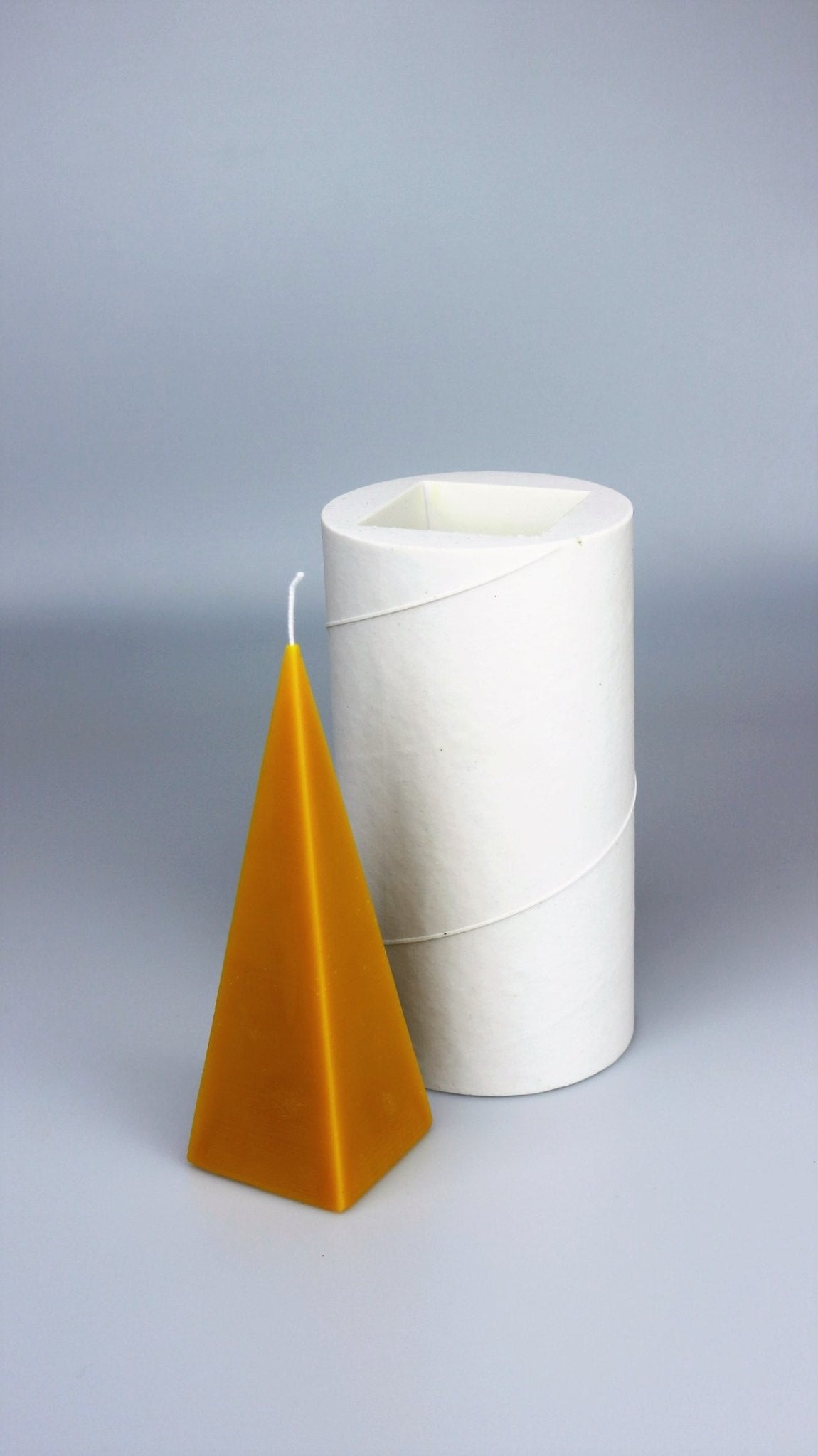 Pyramid beeswax candle and silicone mould
