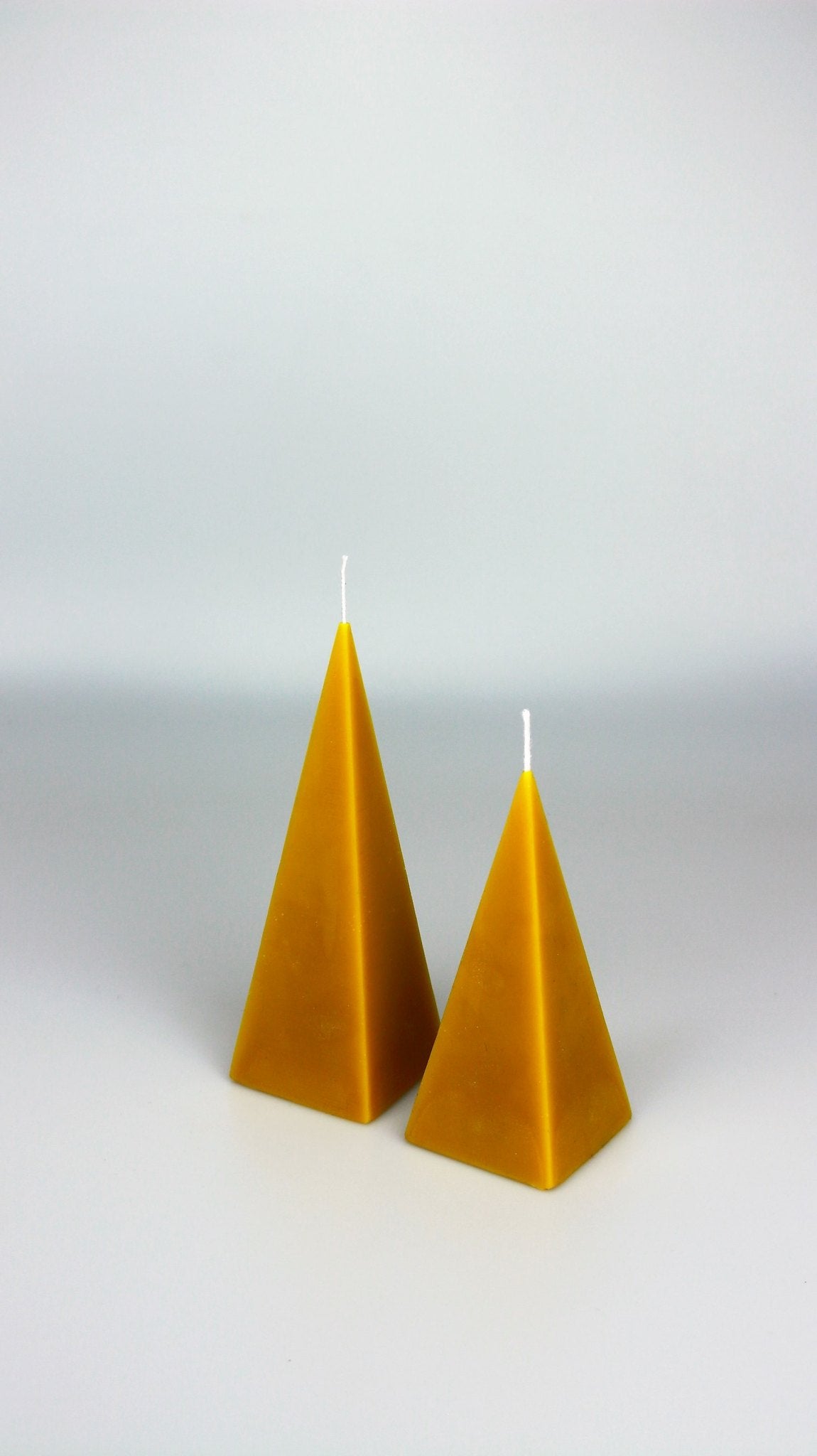 Pyramid beeswax candle and silicone mould
