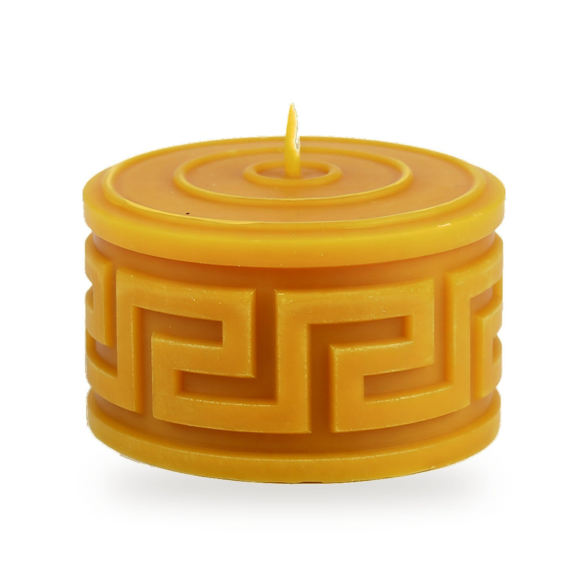 Square Waves round beeswax candle with a key-pattern band on a white background