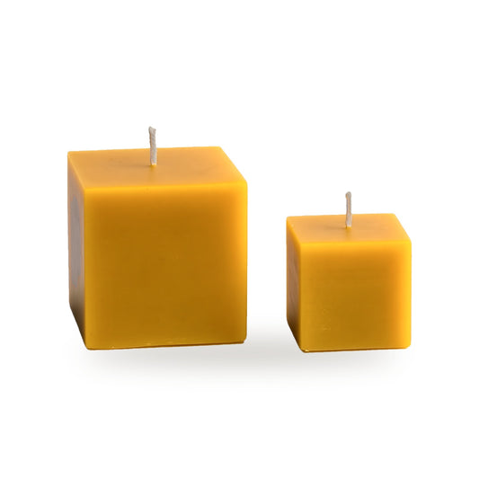 Cute Cubes beeswax candle, white background studio photo