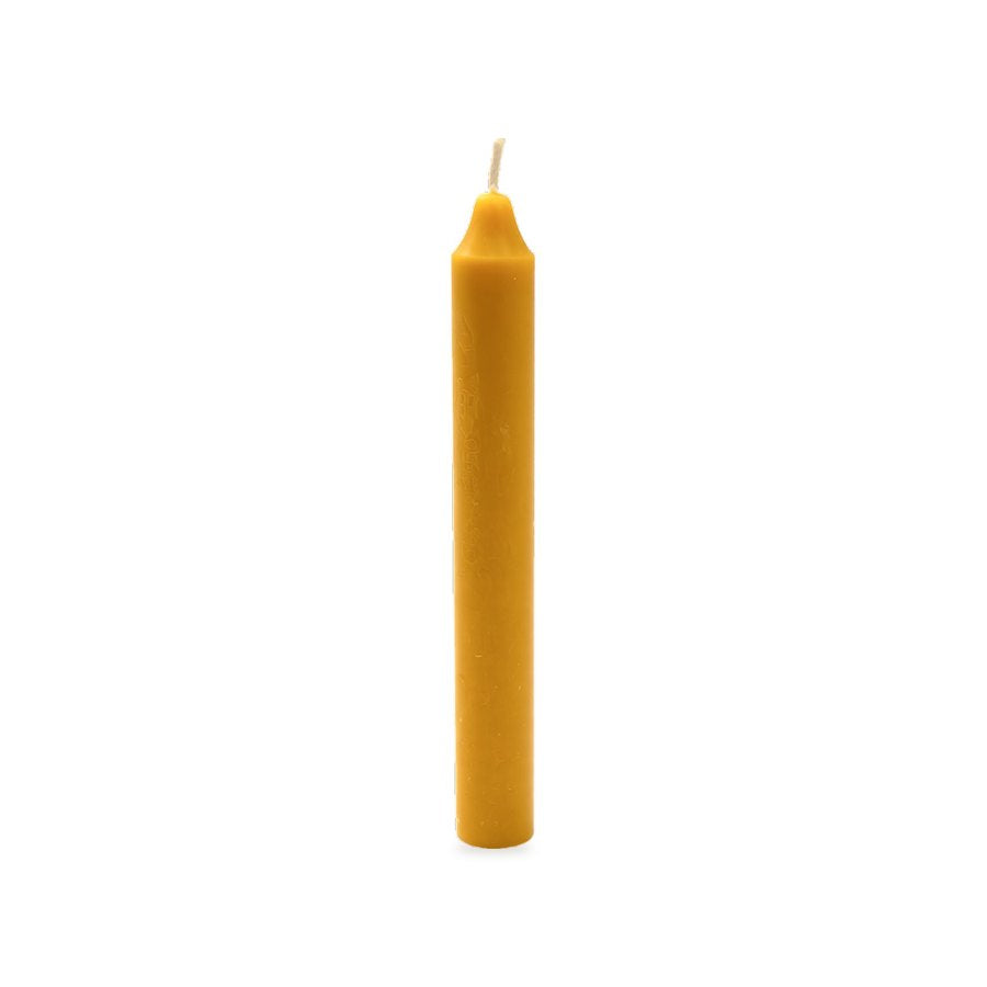Daily beeswax candle, white background studio photo