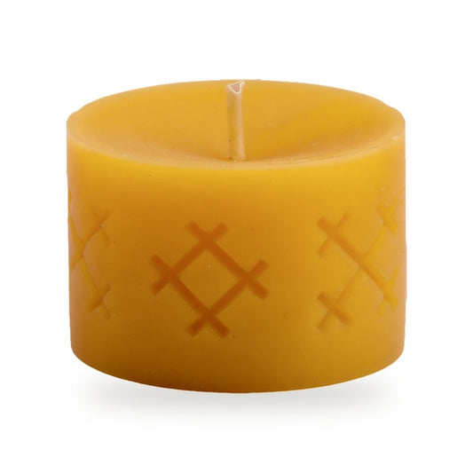 Ethno 1 beeswax candle, white background studio photo