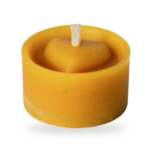 Heart In Tea Lights beeswax candle, white background studio photo