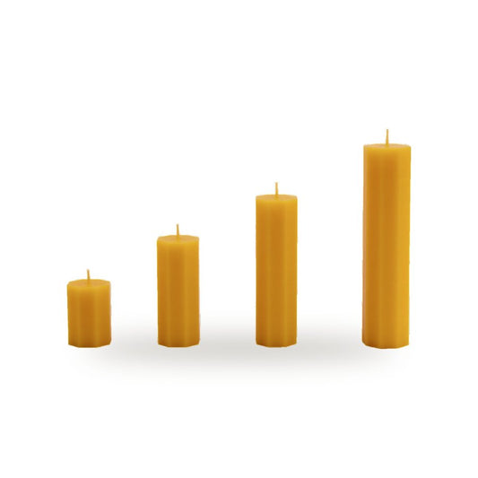 Octagon beeswax candle, white background studio photo