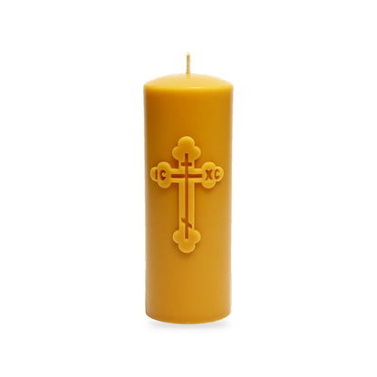 Orthodox Cross Pillar beeswax candle, white background studio photo