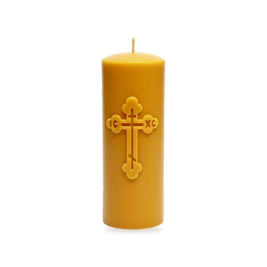 Orthodox Cross Pillar beeswax candle, white background studio photo