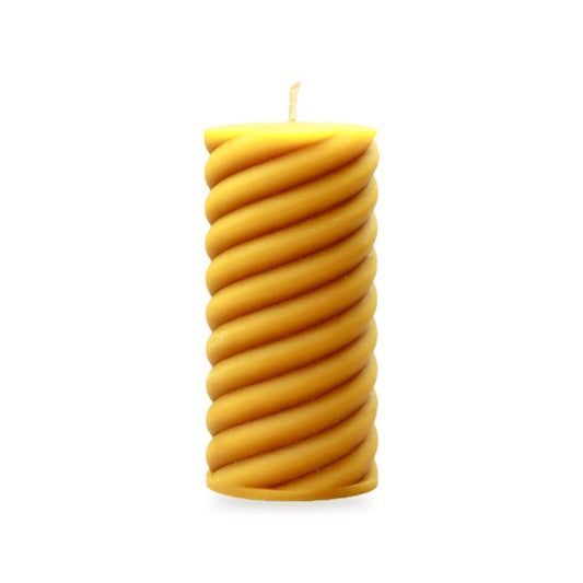 Spiral Pillars beeswax candle, white background studio photo