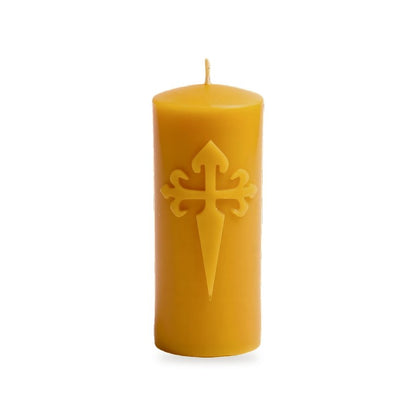 St James Cross beeswax candle, white background studio photo