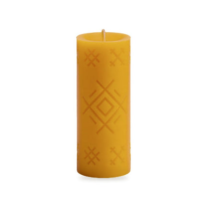Well Mark beeswax candle, white background studio photo