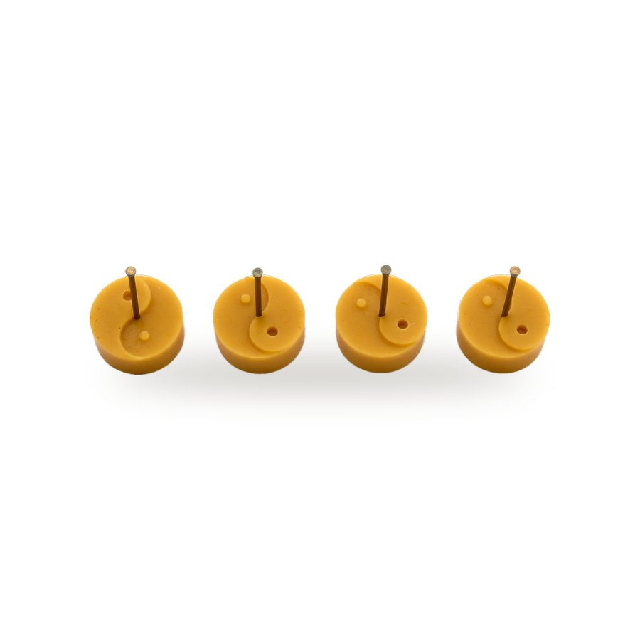 Ying Yang Tea Lights beeswax candle, white background studio photo