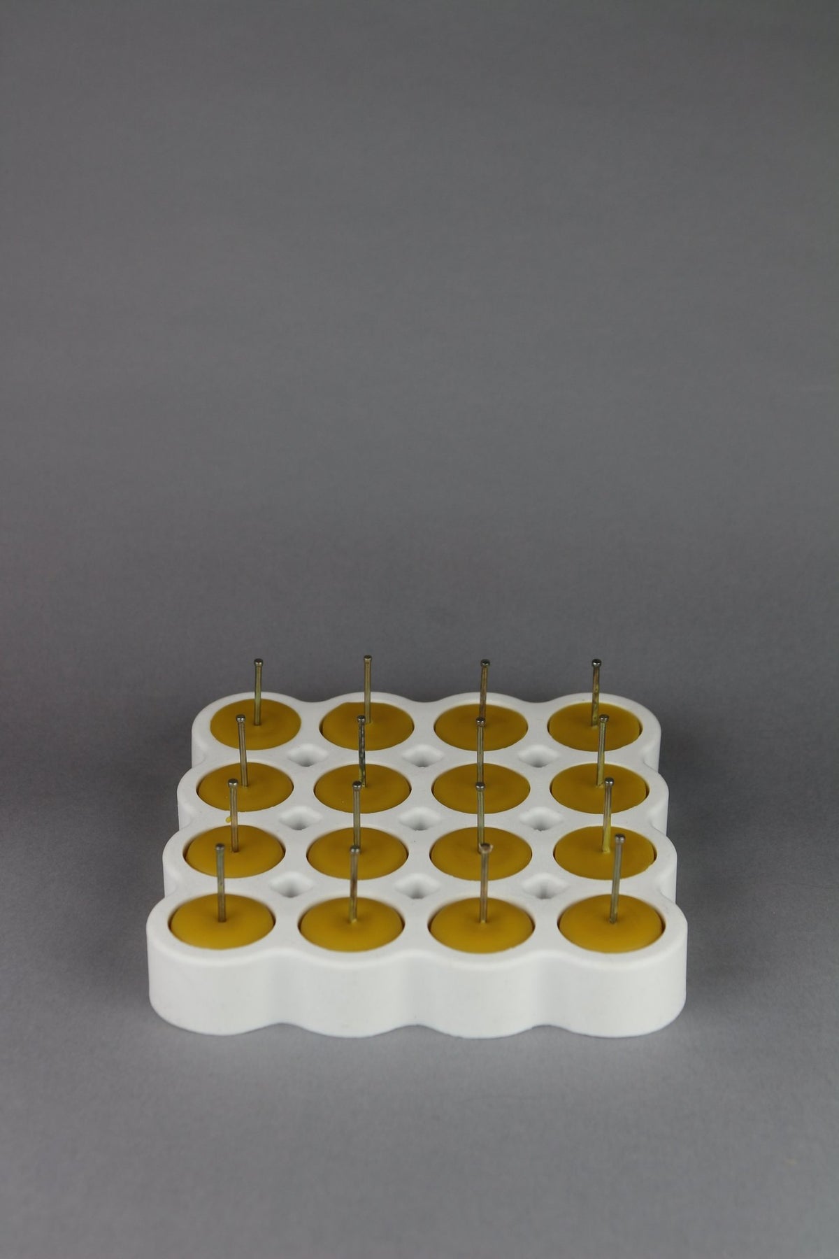 Tea light beeswax candle and silicone mould