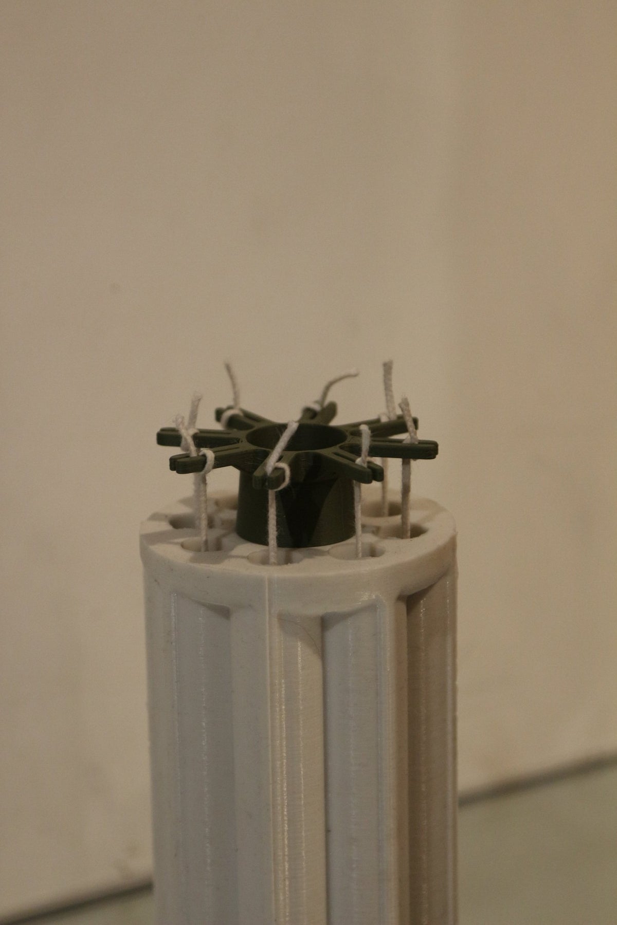 3D-printed wick holder for silicone candle moulds