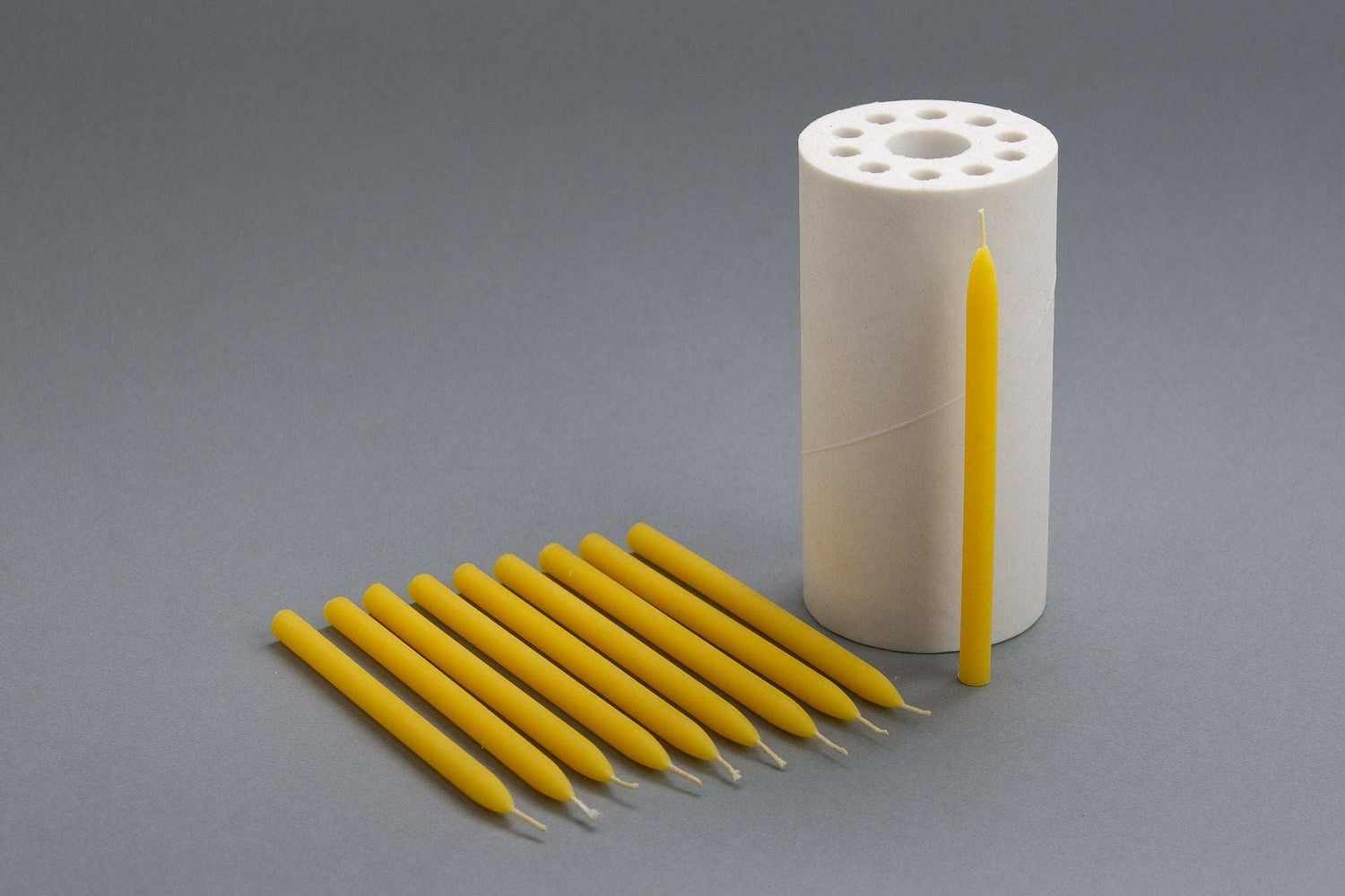 Silicone mold for casting very thin miniature beeswax taper candles