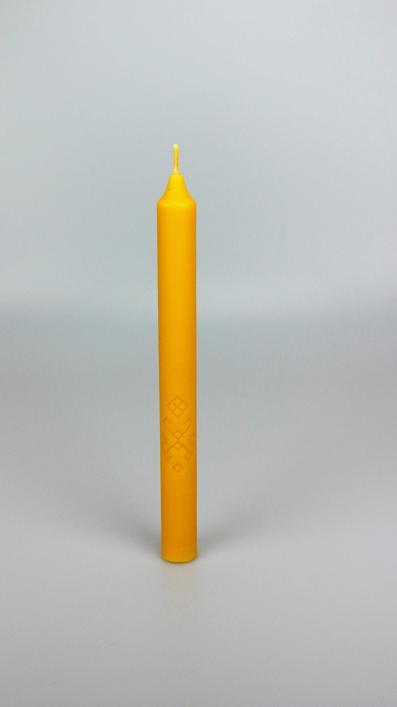 TAPERS WITH ORNAMENTCandle details:
Size of Finished Candle: 9.05" / 0.86" at the base (23 cm high x 2 cm wide).Weight of Each Candle: 80 gSilicone MoldLatvian CandlesLatvian CandlesORNAMENT Silicone Candle mould