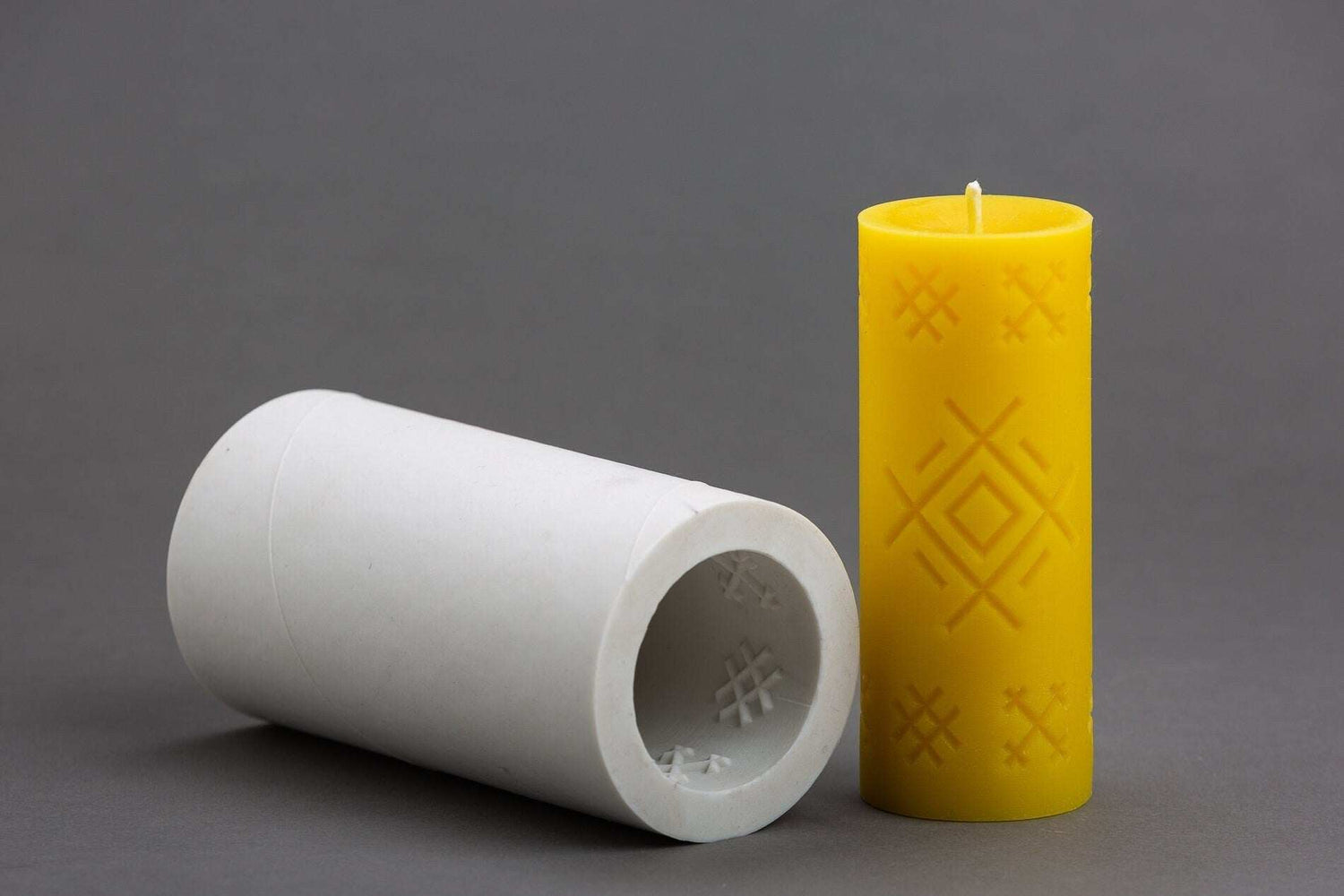 Silicone mold for beeswax candles with well mark symbol